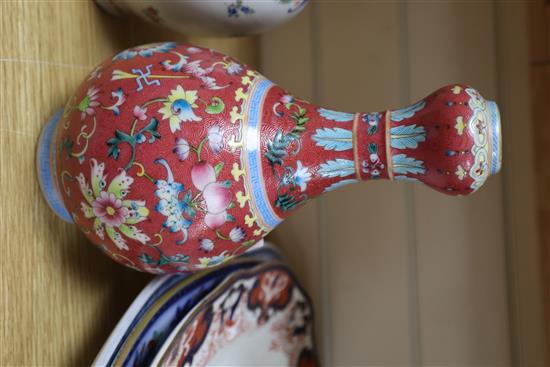 A pair of Chinese garlic neck vases and a famille rose teapot